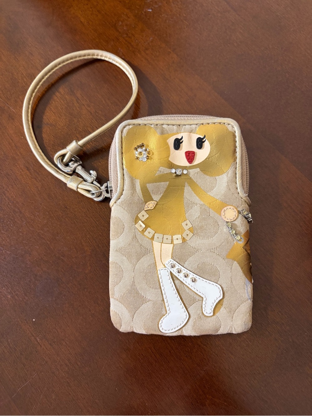Coach Poppy Chan "Goldy" Small Wristlet Camera Pouch.
